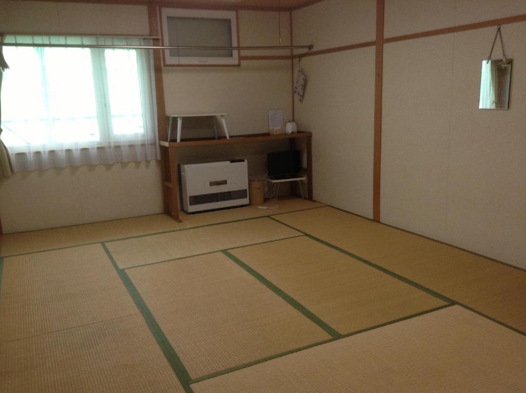 Minshuku Akiba Hotel NakaNakafurano Værelse billede